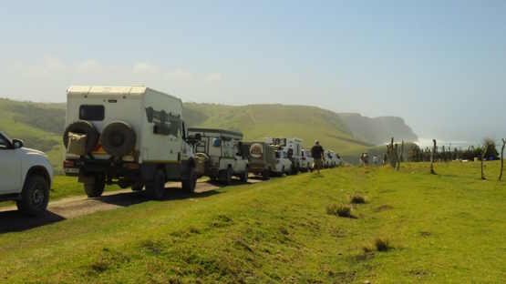 4x4 Vehicles on a dirt road leading down to the Lubanzi